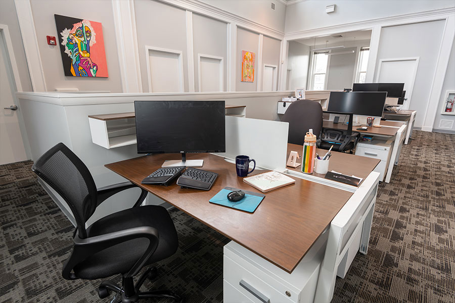 Your dedicated desk comes fully equipped with an office chair and a lockable filing cabinet.
